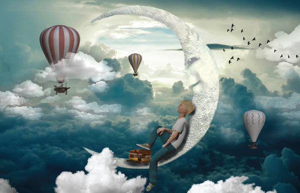 boy dreaming on the moon image with books for writers